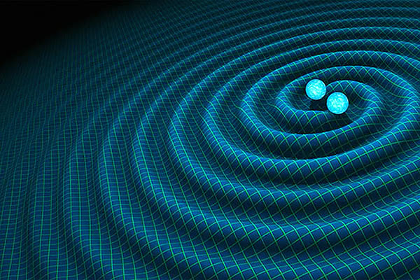 A schematic of an event causing gravitational waves. Two balls near each other. Apparently they are colliding. The waves are emanating around them.